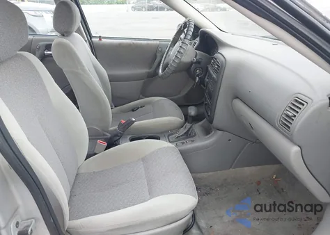 2002 Saturn L-Series L100 из США, поврежденный, VIN 1G8JS54F22Y551085